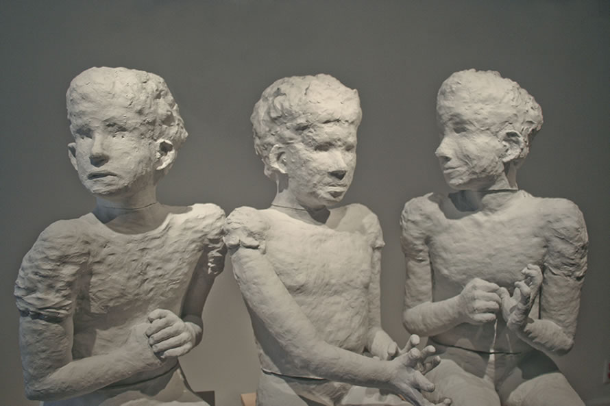 Three Seated Figures